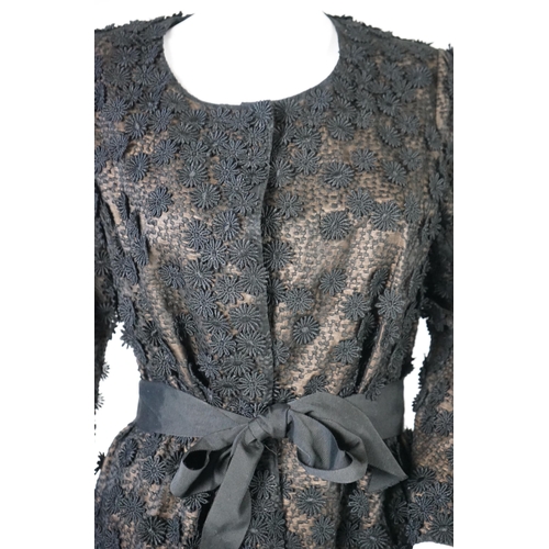 1019 - A Nicole Farhi lady's black lace knee length jacket with flower embellishment all over with black ri... 