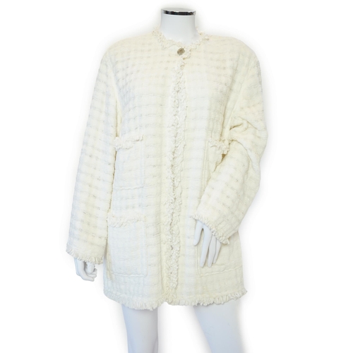 1026 - A Chanel early 1990's cream boutique jacket, with fringing to all edges, single CC silver-tone butto... 