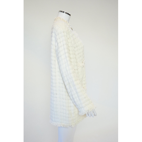 1026 - A Chanel early 1990's cream boutique jacket, with fringing to all edges, single CC silver-tone butto... 