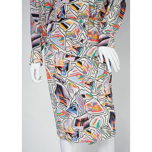 1028 - A Karl Lagerfeld lady's multi colour silk suit and a pair of velvet trousers, both size 38