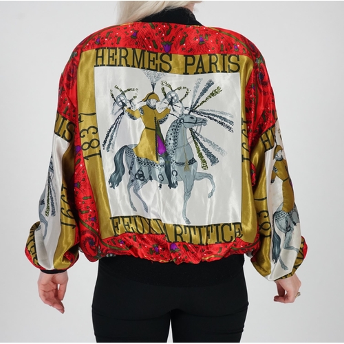 1031 - A Hermès silk bomber jacket, Jacket reads Hermes Paris 1837-1992, fully lined with zip up the front ... 