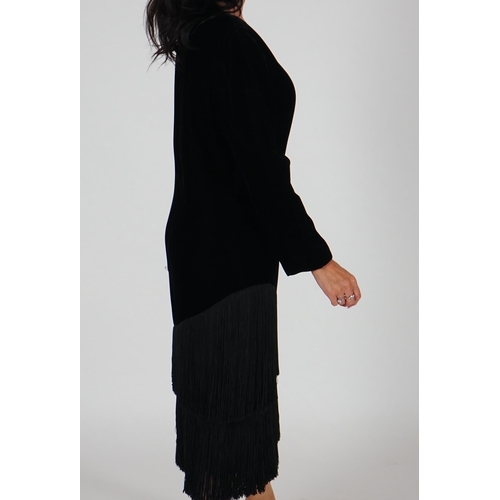 1032 - A vintage Lanvin black velvet dress with fringe, long sleeve sheath with a crew neckline semi fitted... 