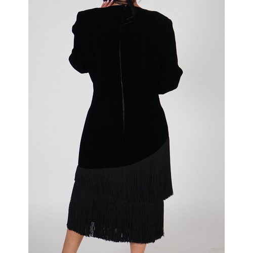 1032 - A vintage Lanvin black velvet dress with fringe, long sleeve sheath with a crew neckline semi fitted... 