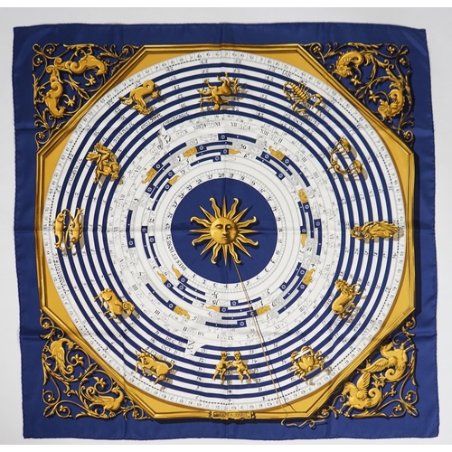 1040 - A Hermès Dies et Hore navy silk scarf, 90cm x 90cm