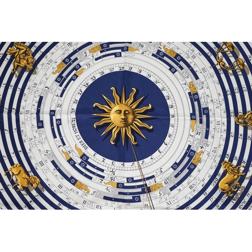 1040 - A Hermès Dies et Hore navy silk scarf, 90cm x 90cm