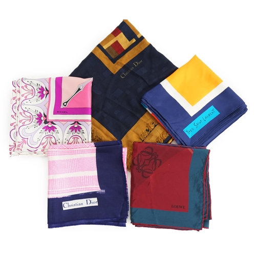 1047 - A selection of Yves Saint Laurent, two Christian Dior, Richel and Loewe silk scarves, YSL, blues gol... 