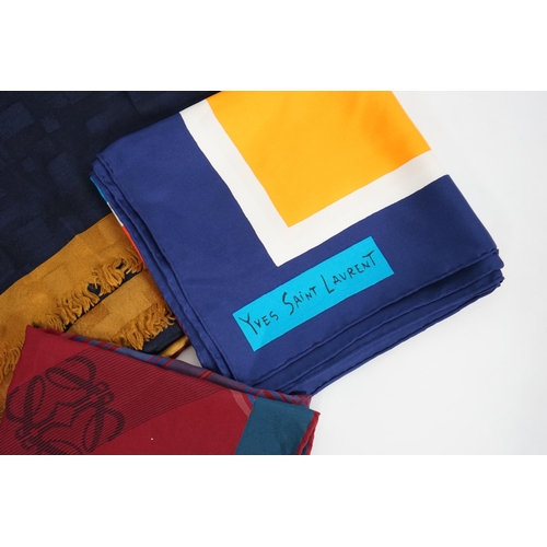 1047 - A selection of Yves Saint Laurent, two Christian Dior, Richel and Loewe silk scarves, YSL, blues gol... 