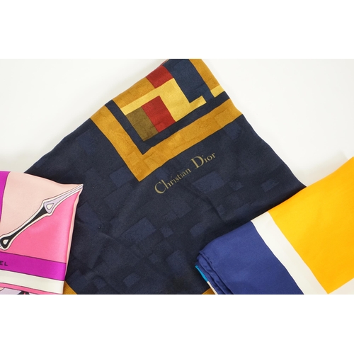 1047 - A selection of Yves Saint Laurent, two Christian Dior, Richel and Loewe silk scarves, YSL, blues gol... 