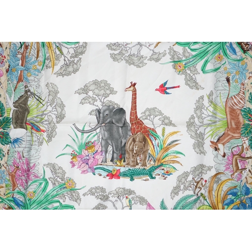 1052 - A Gucci 'Jungle' silk scarf, signed V. Accorneroa, printed with jungle creatures by Vittorio Accorne... 