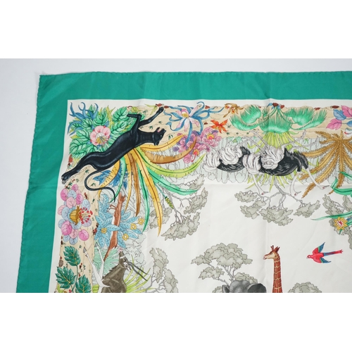 1052 - A Gucci 'Jungle' silk scarf, signed V. Accorneroa, printed with jungle creatures by Vittorio Accorne... 