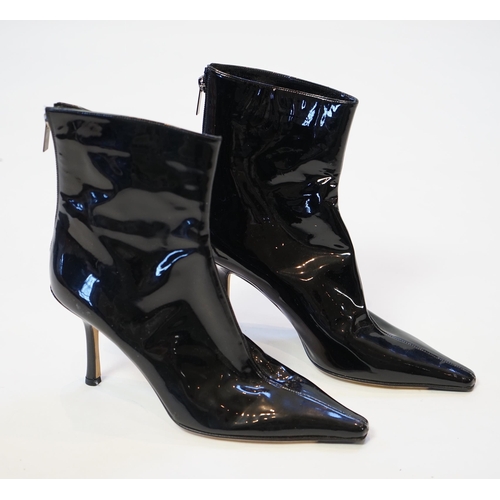 1054 - Two pairs of Jimmy Choo black leather heeled lady's boots, one short patent leather and the other lo... 