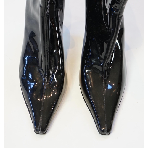 1054 - Two pairs of Jimmy Choo black leather heeled lady's boots, one short patent leather and the other lo... 