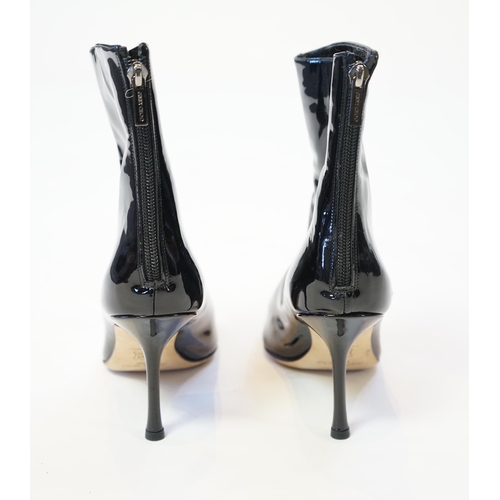 1054 - Two pairs of Jimmy Choo black leather heeled lady's boots, one short patent leather and the other lo... 