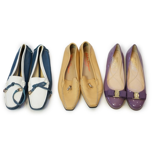 1067 - Three pairs of Salvatore Ferragamo flat lady's shoes, blue and white, mauve with fabric bow and ligh... 