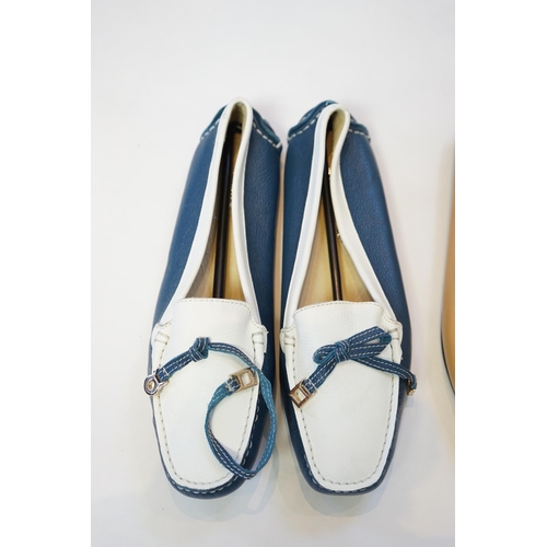 1067 - Three pairs of Salvatore Ferragamo flat lady's shoes, blue and white, mauve with fabric bow and ligh... 