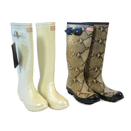 1076 - Two pairs of lady's Hunter snake-skin effect wellington boots, size UK 7