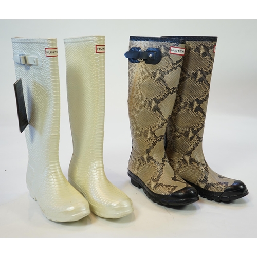 1076 - Two pairs of lady's Hunter snake-skin effect wellington boots, size UK 7