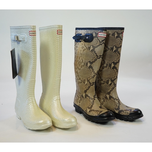 1076 - Two pairs of lady's Hunter snake-skin effect wellington boots, size UK 7