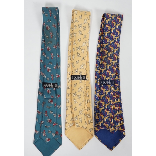 1078 - Three Hermès gentlemen's assorted patterned silk ties