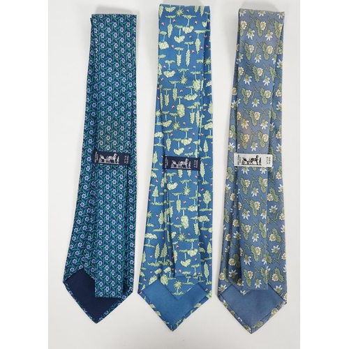 1079 - Three Hermès gentlemen's assorted patterned silk ties