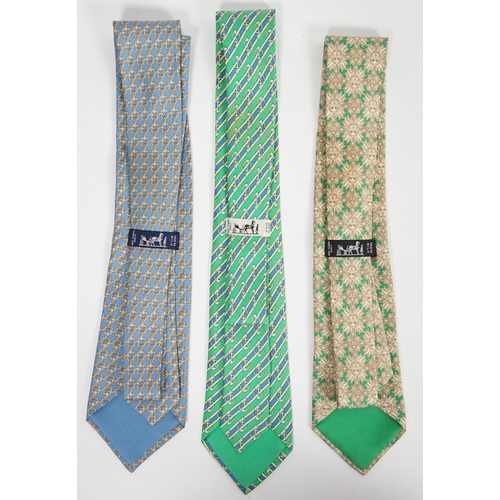 1080 - Three Hermès gentlemen's assorted patterned silk ties