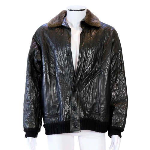 1081 - A Yves Saint Laurent Fourrures gentlemen's black quilted leather bomber jacket with fur collar and l... 