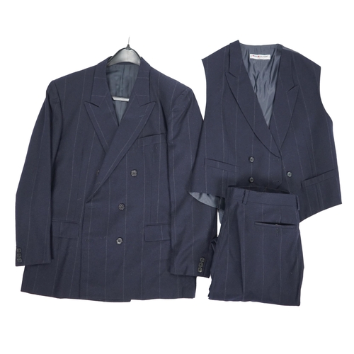 1083 - A Saint Laurent rive gauche gentlemen's navy chalk stripe three-piece double breasted wool suit, jac... 