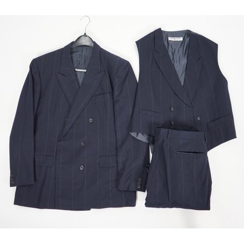 1083 - A Saint Laurent rive gauche gentlemen's navy chalk stripe three-piece double breasted wool suit, jac... 