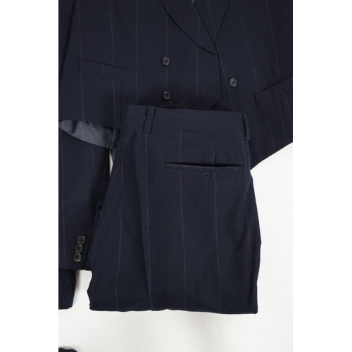 1083 - A Saint Laurent rive gauche gentlemen's navy chalk stripe three-piece double breasted wool suit, jac... 