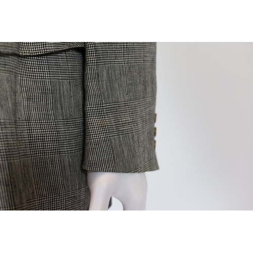 1085 - A Saint Laurent rive gauche gentlemen's Prince of Wales check double breasted linen suit, approx siz... 