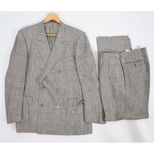 1085 - A Saint Laurent rive gauche gentlemen's Prince of Wales check double breasted linen suit, approx siz... 