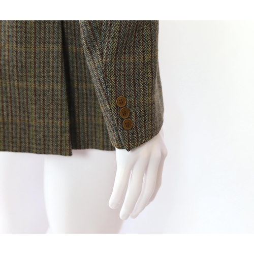 1090 - A Saint Laurent rive gauche gentlemen's wool tweed jacket, approx size 42"