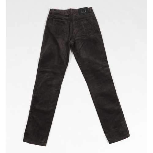 1095 - Two pairs of lady's black Prada trousers and one pair of Versace brown velvet trousers, two jodhpur ... 