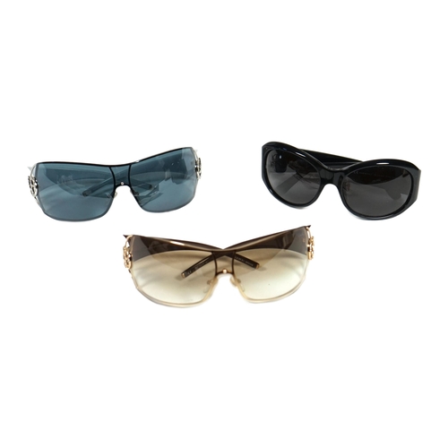 1103 - Three pairs of lady's Giorgio Armani sunglasses with cases and dust bags.