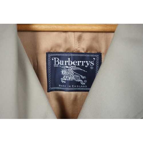 1107 - A lady's Burberry trench coat with padded detachable lining, c.2005, size 12