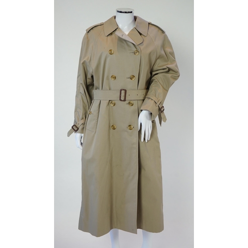 1107 - A lady's Burberry trench coat with padded detachable lining, c.2005, size 12