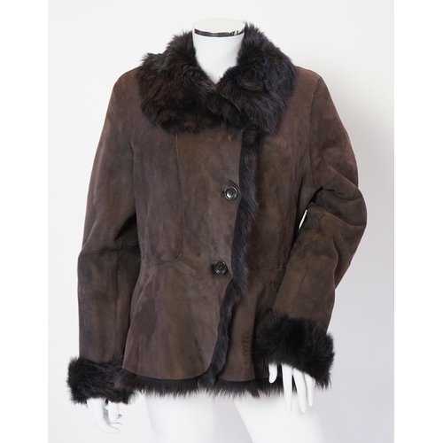 1111 - A lady's L K Bennett brown shearling jacket, size Large