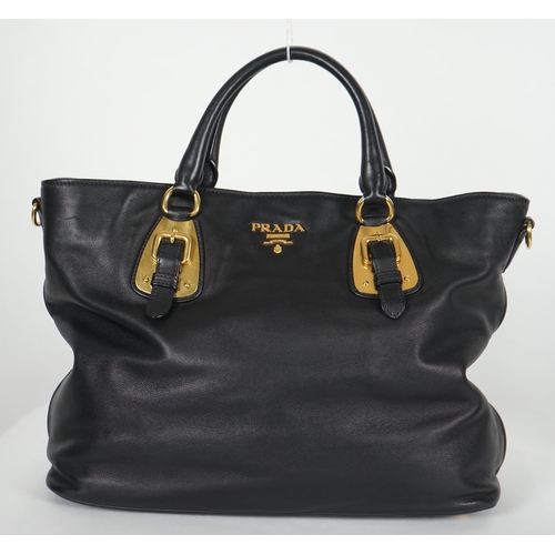 1118 - A Prada Vitello black leather bag with detachable strap, gilt metalware with dust bag, width 40cm, m... 