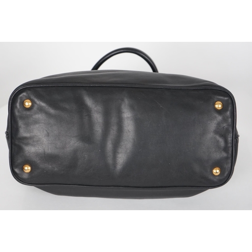 1118 - A Prada Vitello black leather bag with detachable strap, gilt metalware with dust bag, width 40cm, m... 