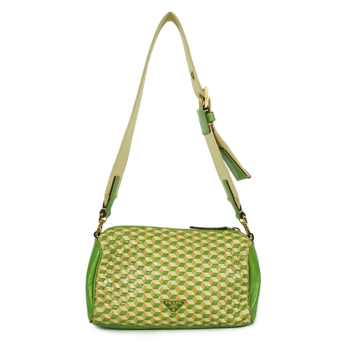 1125 - A Prada green and beige leather Intreccio Cube shoulder bag, zip closure with lock included. Woven c... 