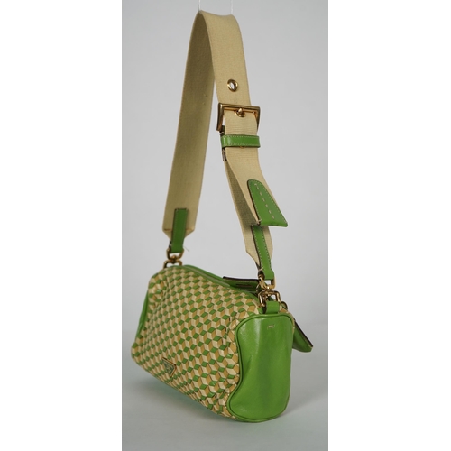 1125 - A Prada green and beige leather Intreccio Cube shoulder bag, zip closure with lock included. Woven c... 