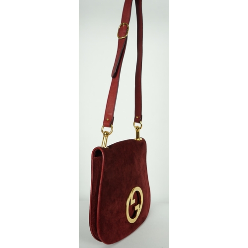 1126 - A vintage Gucci Blondie claret suede shoulder bag, Gucci gold toned intertwined double G logo is fro... 