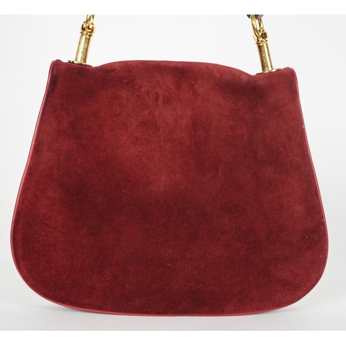 1126 - A vintage Gucci Blondie claret suede shoulder bag, Gucci gold toned intertwined double G logo is fro... 