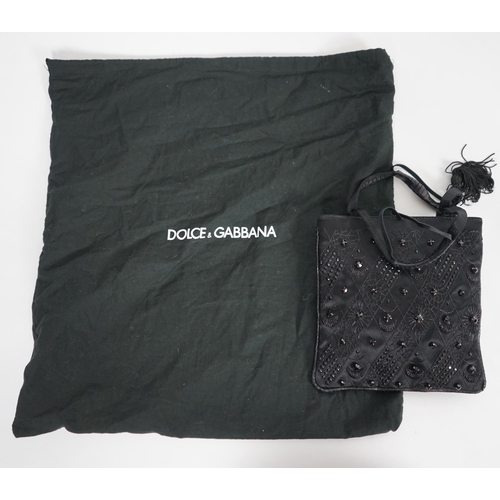 1127 - A Dolce & Gabbana black satin embellished and embroidered evening bag, with black cord tassels and l... 