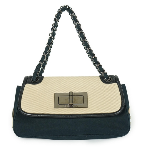 1128 - ** ** A Chanel No 5 Madamoiselle tri colour canvas and leather, chain shoulder handbag, with dust ba... 