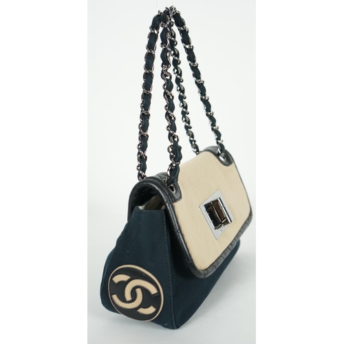 1128 - ** ** A Chanel No 5 Madamoiselle tri colour canvas and leather, chain shoulder handbag, with dust ba... 