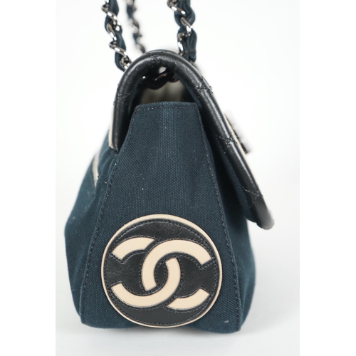 1128 - ** ** A Chanel No 5 Madamoiselle tri colour canvas and leather, chain shoulder handbag, with dust ba... 