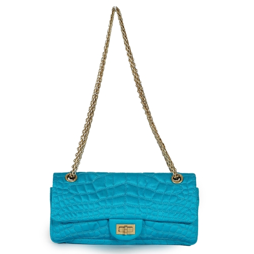 1136 - A Chanel medium-sized 2-55 bag in turquoise blue silk satin stitched with a quilted crocodile patter... 