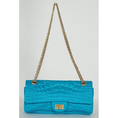 1136 - A Chanel medium-sized 2-55 bag in turquoise blue silk satin stitched with a quilted crocodile patter... 