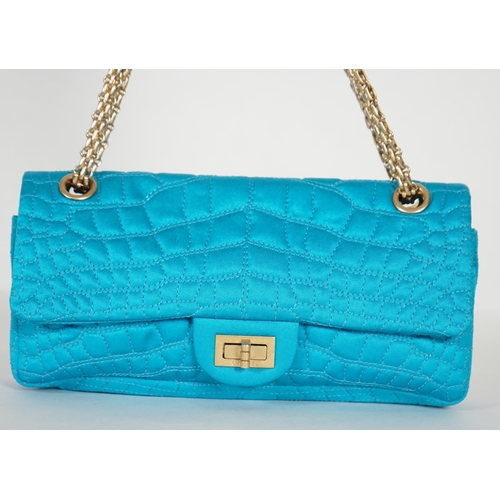 1136 - A Chanel medium-sized 2-55 bag in turquoise blue silk satin stitched with a quilted crocodile patter... 